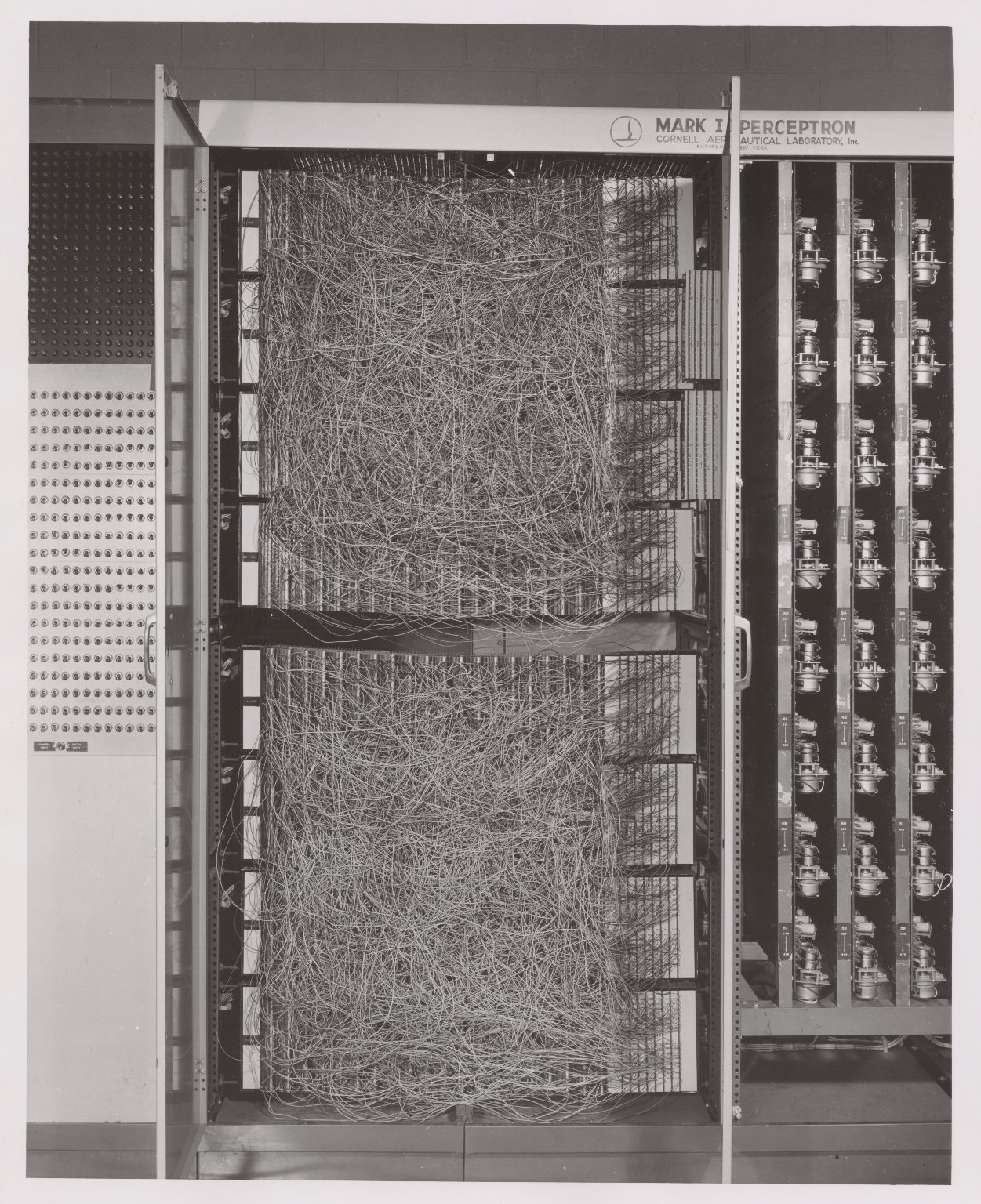 The Mark I Perceptron, the progenitor of modern neural networks. Image courtesy of Cornell University News Service records, #4-3-15. Division of Rare and Manuscript Collections, Cornell University Library.